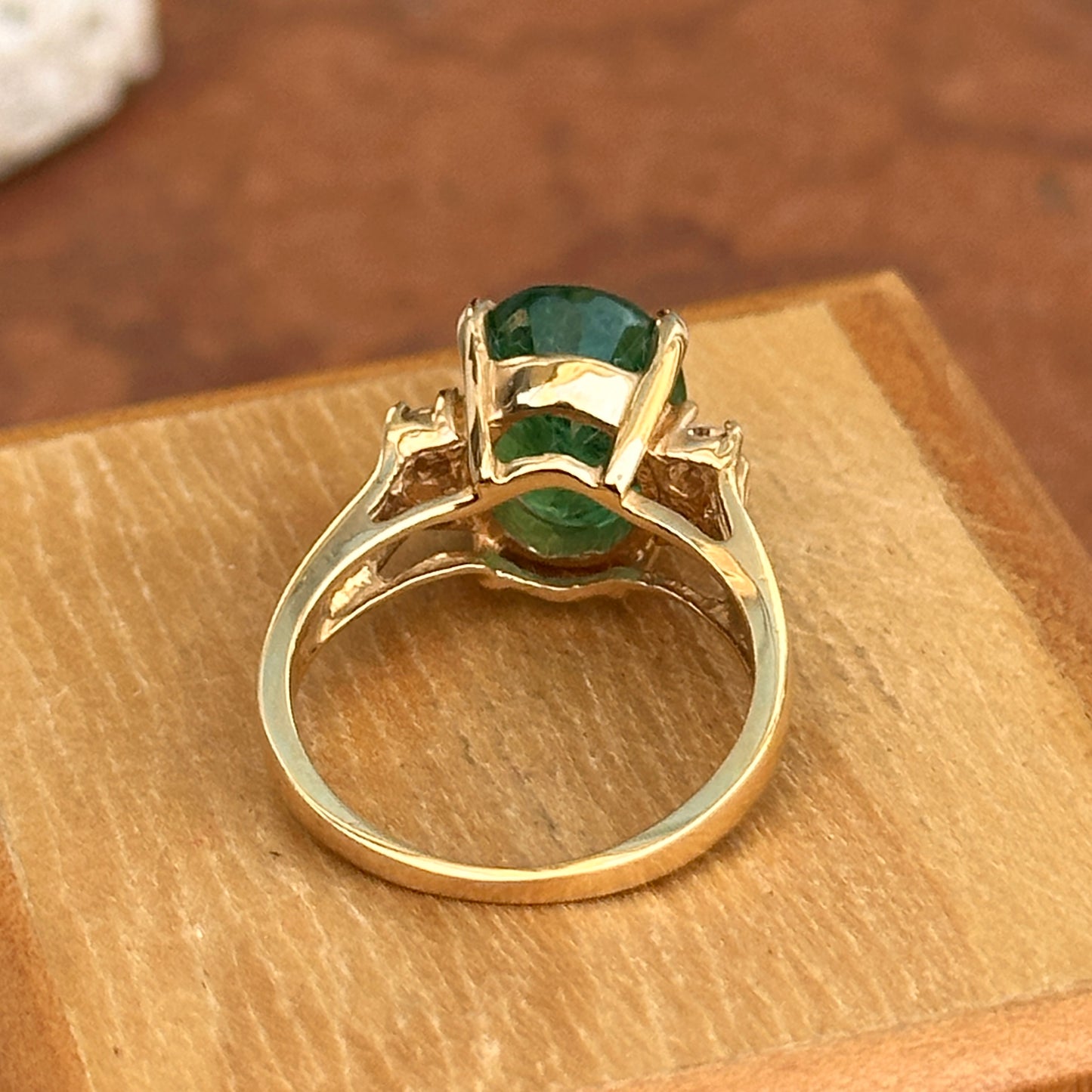 14KT Yellow Gold Oval 3.48 CT Emerald + Round Diamond Ring