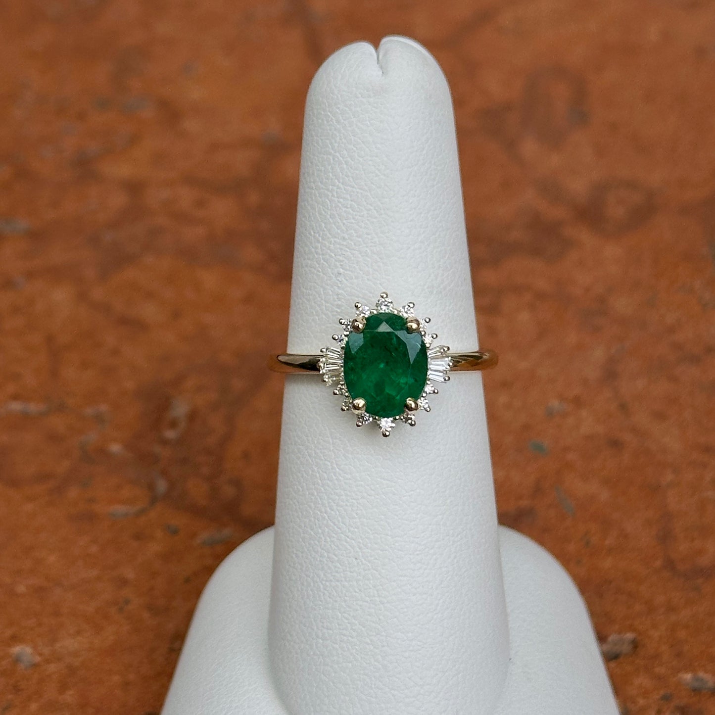 14KT Yellow Gold Oval Colombian Emerald + Baguette Halo Ring