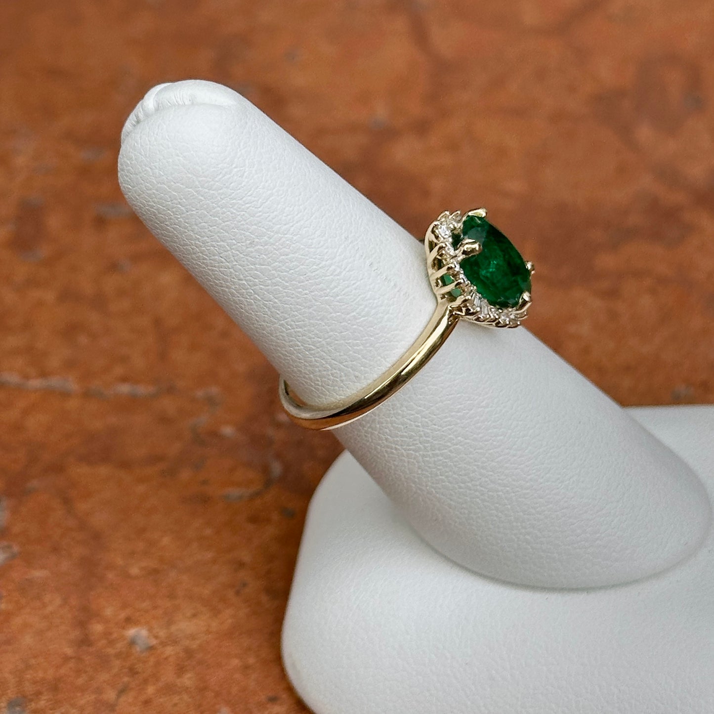 14KT Yellow Gold Oval Colombian Emerald + Baguette Halo Ring