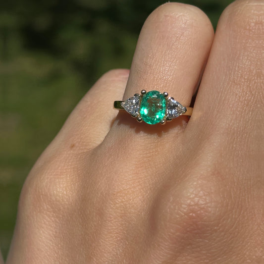 14KT Yellow Gold Oval Emerald + Trillion Diamond Ring