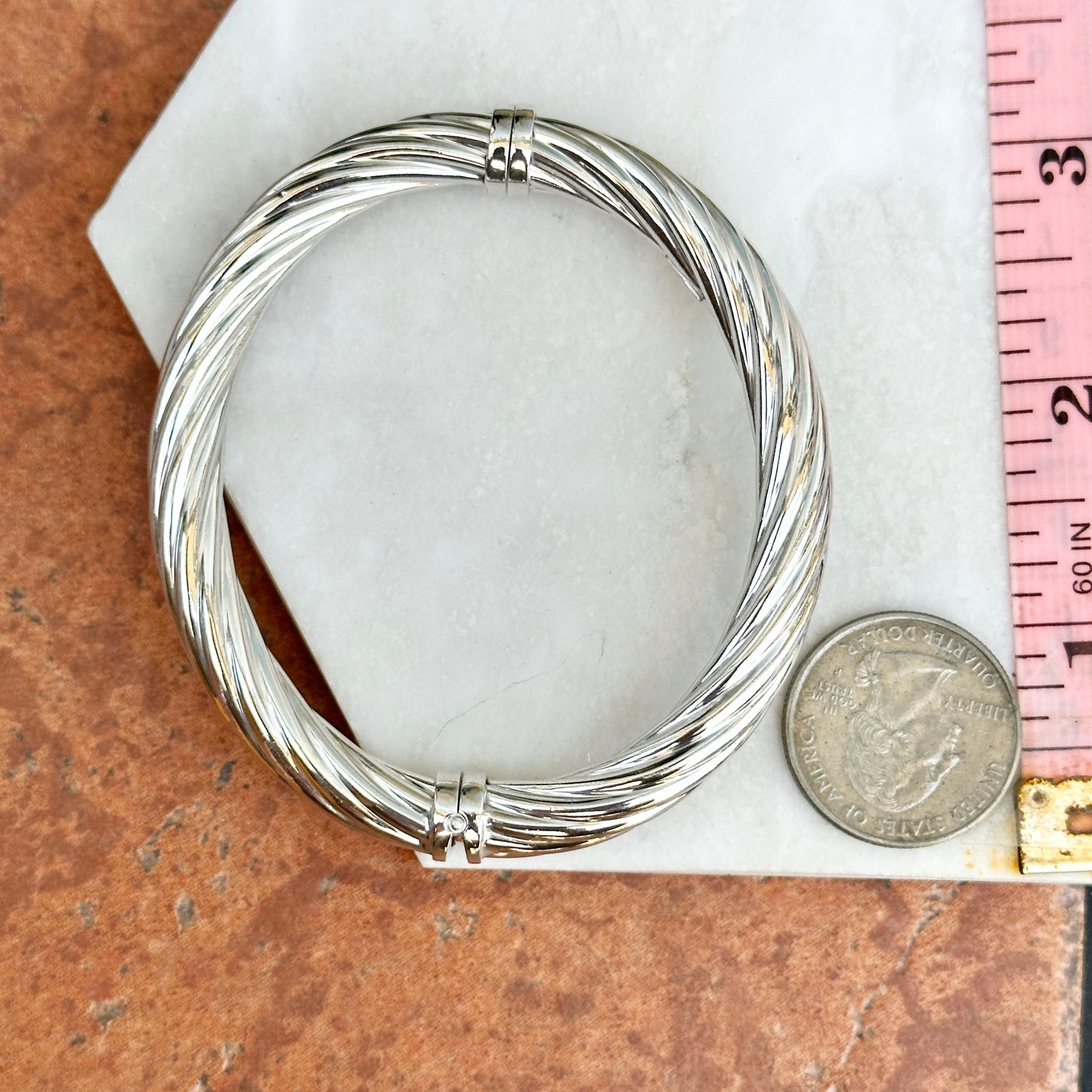 Sterling Silver Ribbed Twist Oval Hinged Bangle Bracelet