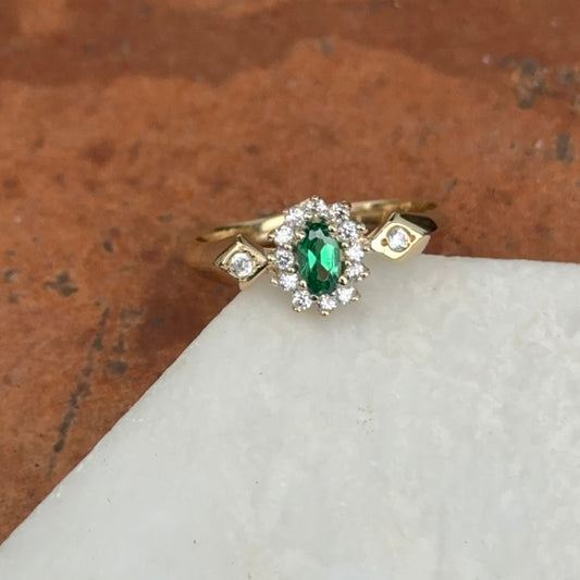 Estate 14KT Yellow Gold Oval Natural Emerald + Halo Diamond Ring