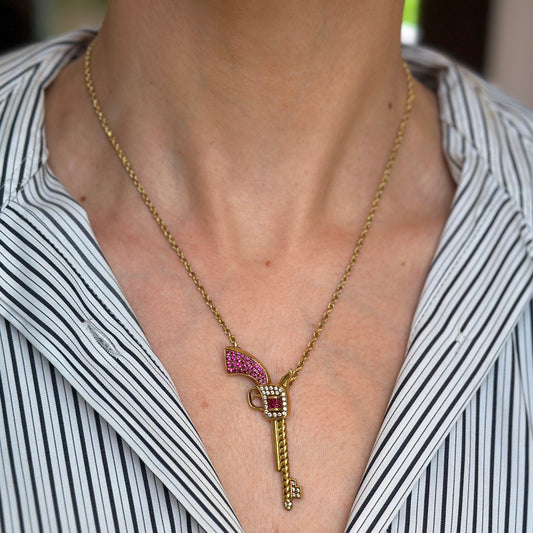 Estate 18KT Yellow Gold Ruby + Diamond Pistol Pendant