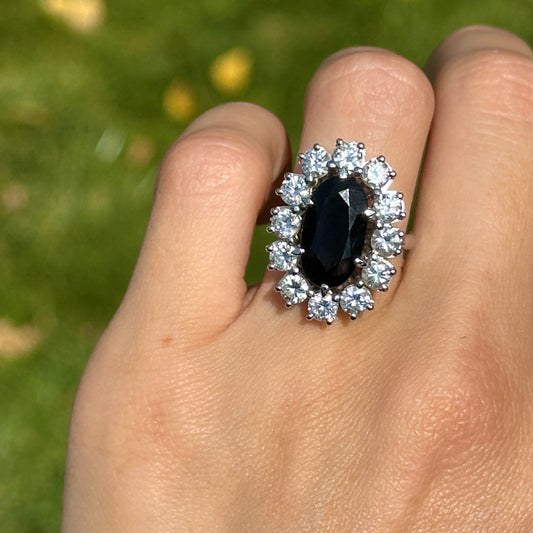 Estate 18KT White Gold Oval 5.22 CT Blue Sapphire + Diamond Halo Ring