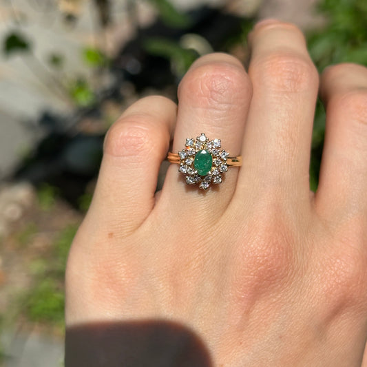 Estate 14KT Yellow Gold Faceted Oval Emerald + Diamond Double Halo Ring