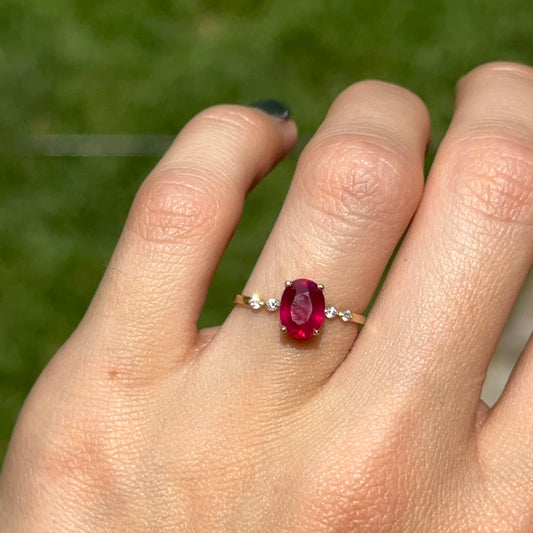 10KT Yellow Gold Oval Ruby + Round Diamond Ring