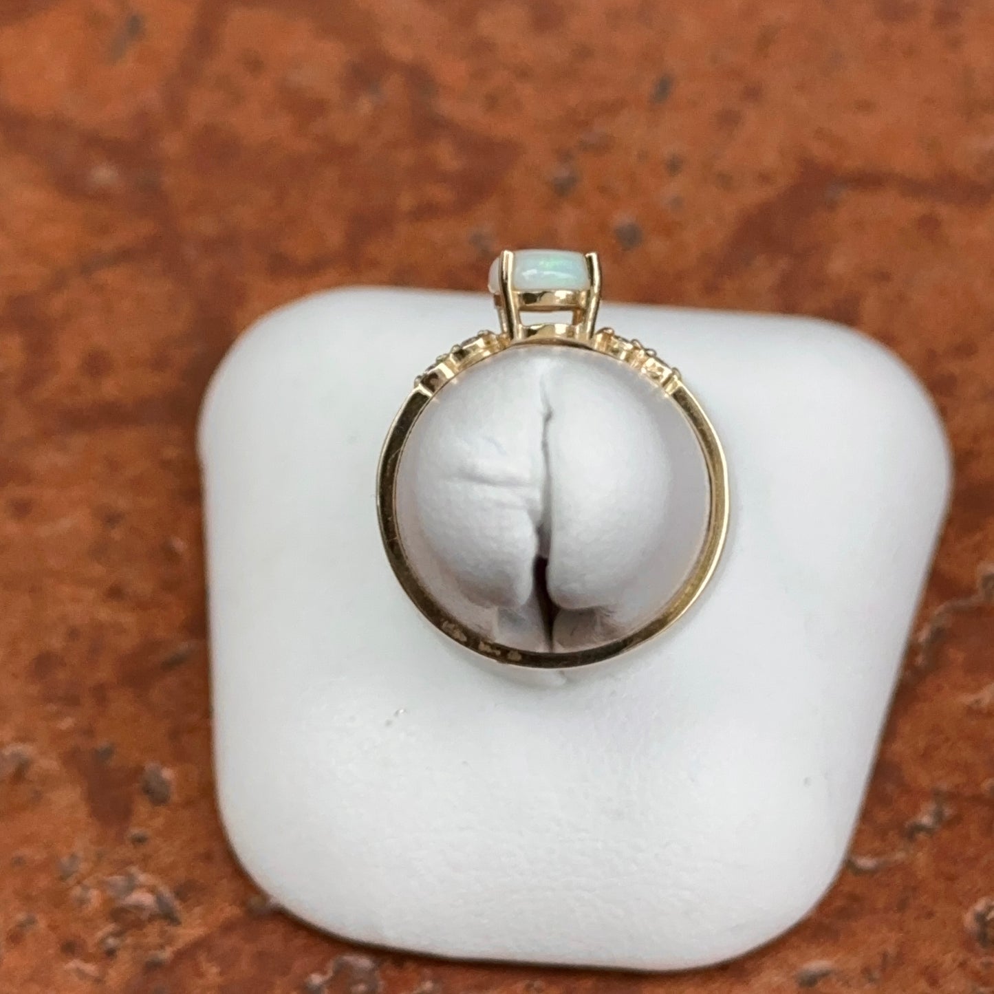 10KT Yellow Gold Oval White Opal and Round Diamond Ring