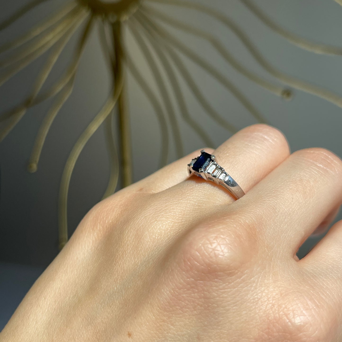 Estate Platinum Emerald-Cut Blue Sapphire + Baguette Diamond Ring