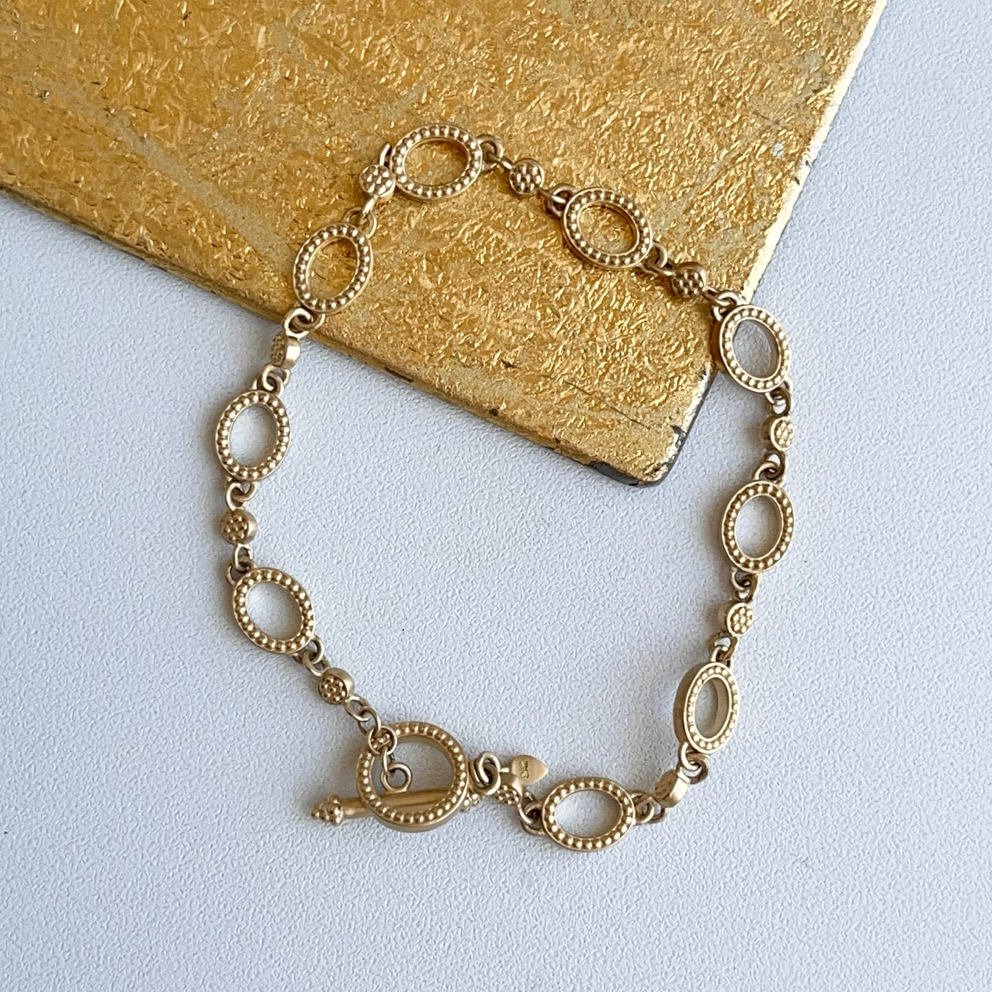 14KT Yellow Gold Oval Textured Links Toggle Claps Bracelet