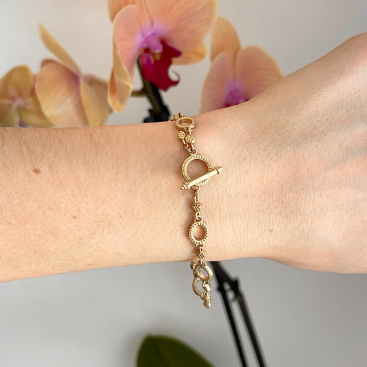 14KT Yellow Gold Oval Textured Links Toggle Claps Bracelet