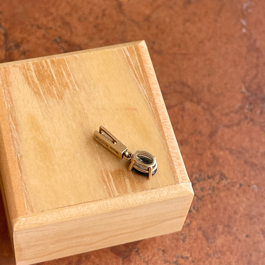 14KT Yellow Gold Oval Blue Sapphire + Round Diamond Pendant