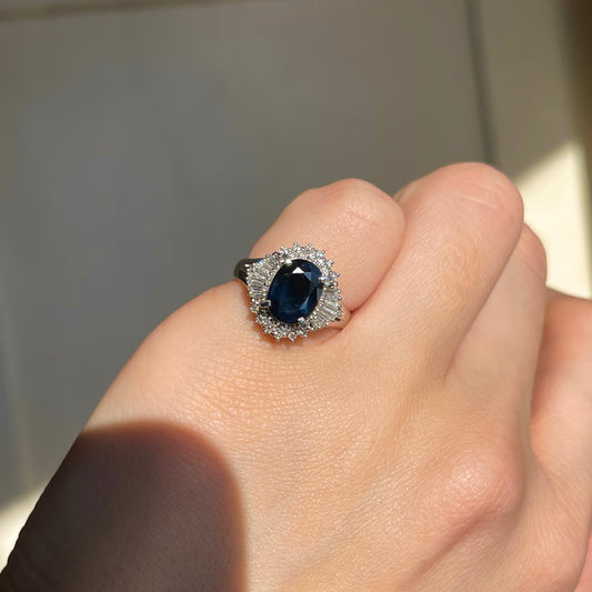 Estate Platinum Oval 2.15 CT Blue Sapphire + Baguette Diamond Halo Ring