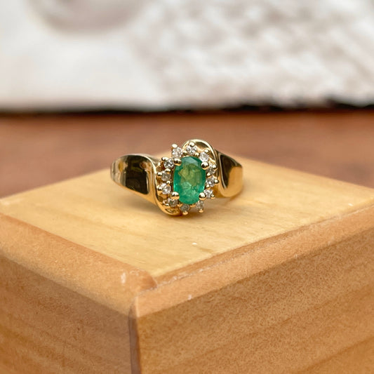Estate 14KT Yellow Gold Oval .65 Carat Emerald + Diamond Halo Concave Ring