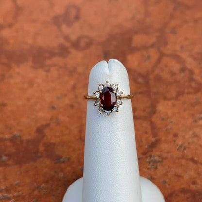 Estate 14KT Yellow Gold Oval Garnet Halo Diamond Ring