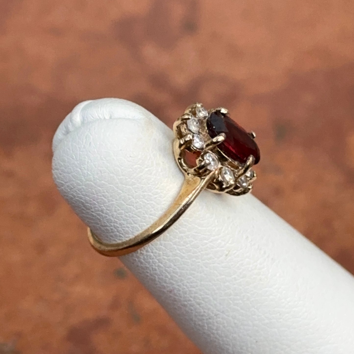 Estate 14KT Yellow Gold Oval Garnet Halo Diamond Ring