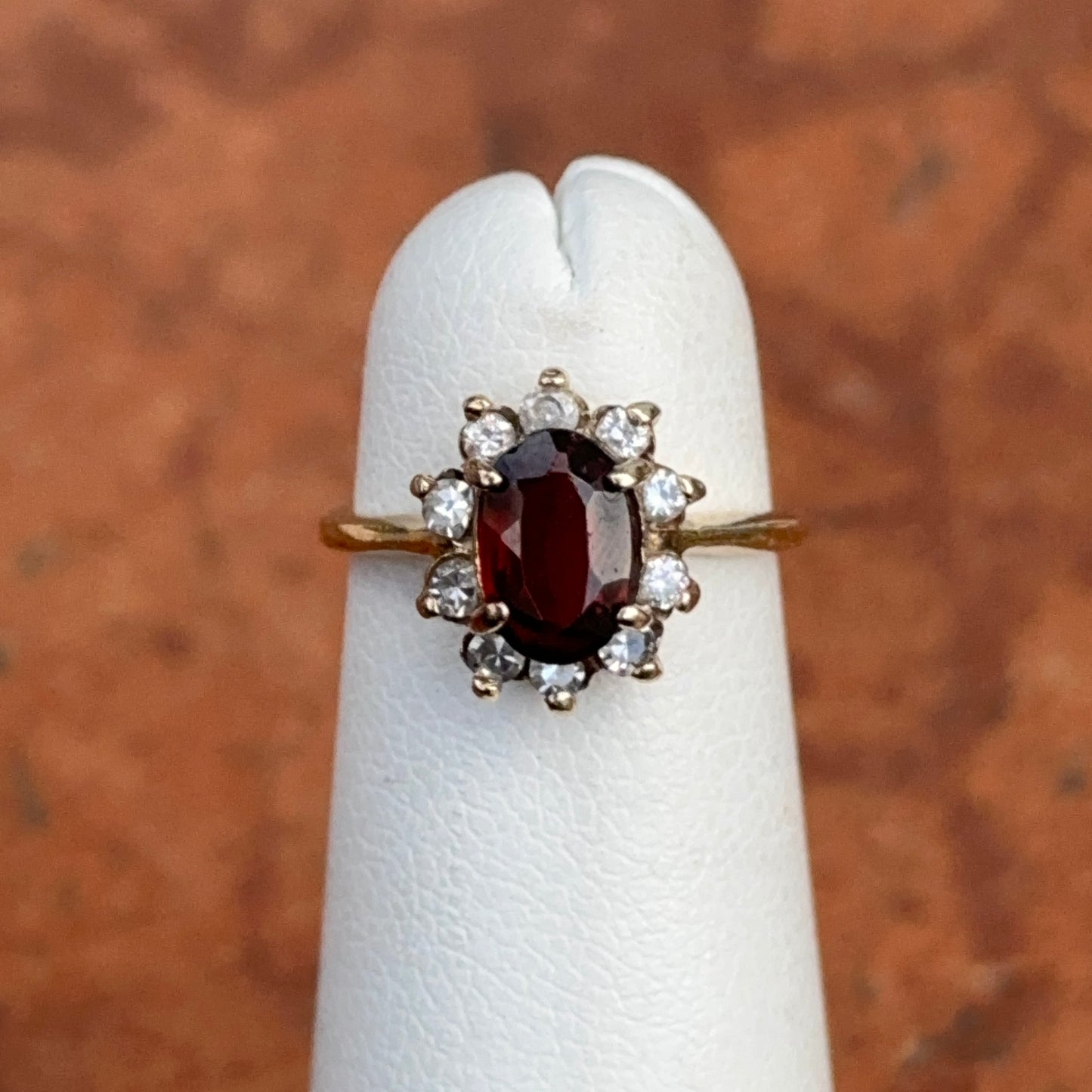 Estate 14KT Yellow Gold Oval Garnet Halo Diamond Ring