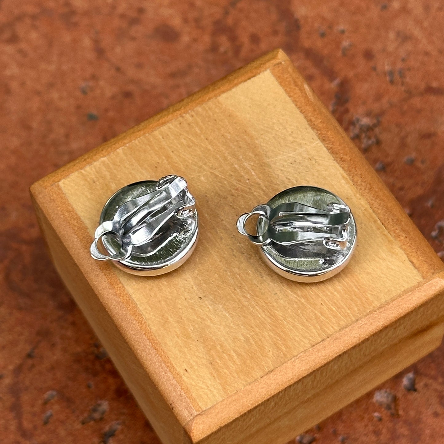 Sterling Silver Rhodium Plated Mother of Pearl Clip On Button Earrings