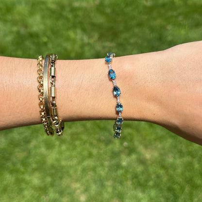 Estate 14KT Yellow Gold Round Diamond + Oval Blue Topaz Link Tennis Bracelet