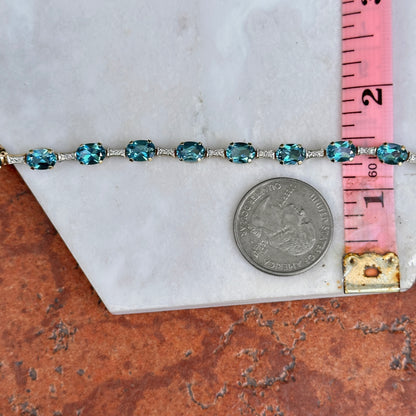 Estate 14KT Yellow Gold Round Diamond + Oval Blue Topaz Link Tennis Bracelet