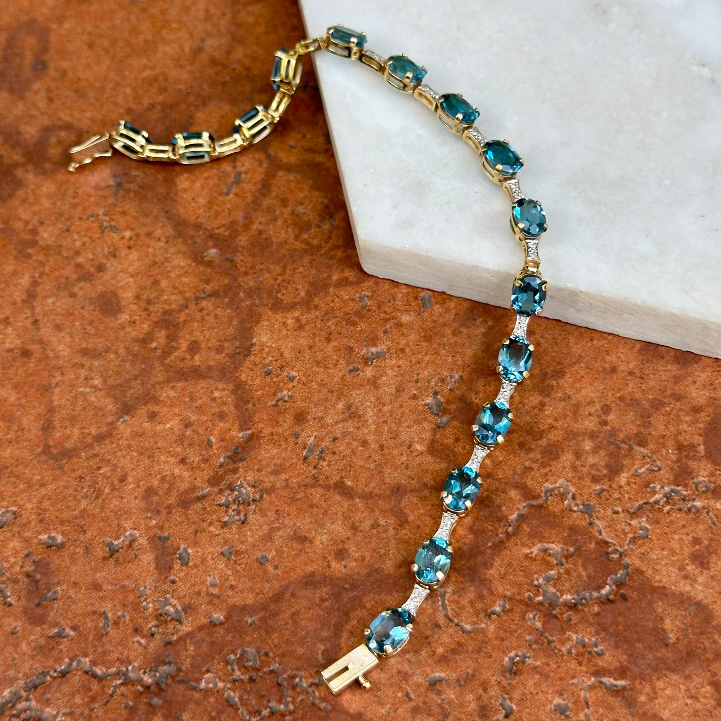 Estate 14KT Yellow Gold Round Diamond + Oval Blue Topaz Link Tennis Bracelet