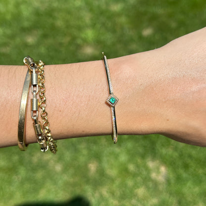 Vintage 14KT Yellow Gold Square Invisible Set Emerald + Diamond Bangle Bracelet