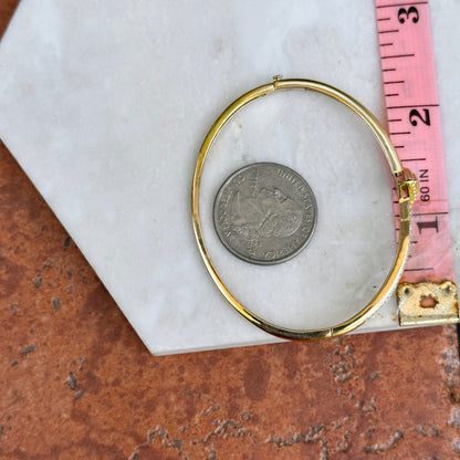 Vintage 14KT Yellow Gold Square Invisible Set Emerald + Diamond Bangle Bracelet