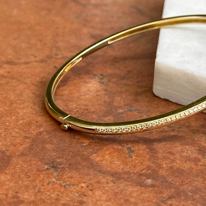 Vintage 14KT Yellow Gold Square Invisible Set Emerald + Diamond Bangle Bracelet