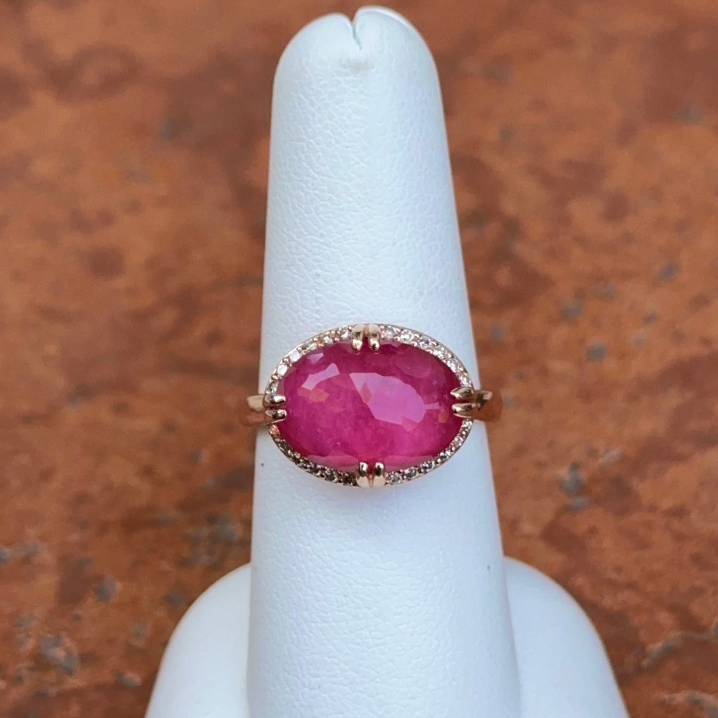 14KT Rose Gold Paul Klecka Oval Ruby + Diamond Halo East West Ring