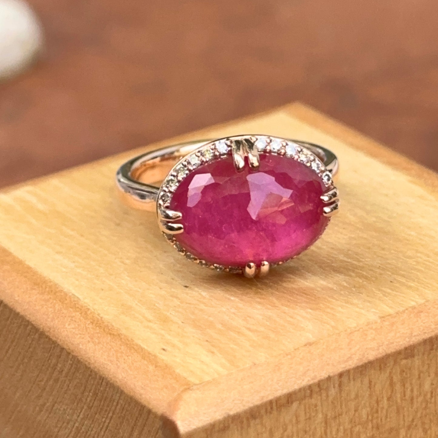 14KT Rose Gold Paul Klecka Oval Ruby + Diamond Halo East West Ring