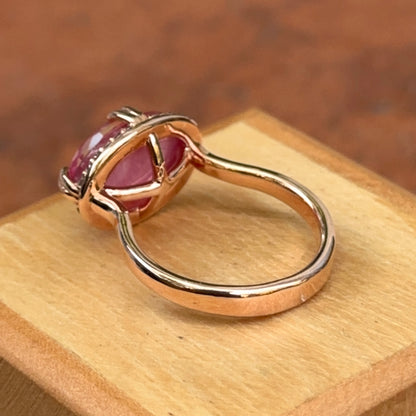 14KT Rose Gold Paul Klecka Oval Ruby + Diamond Halo East West Ring