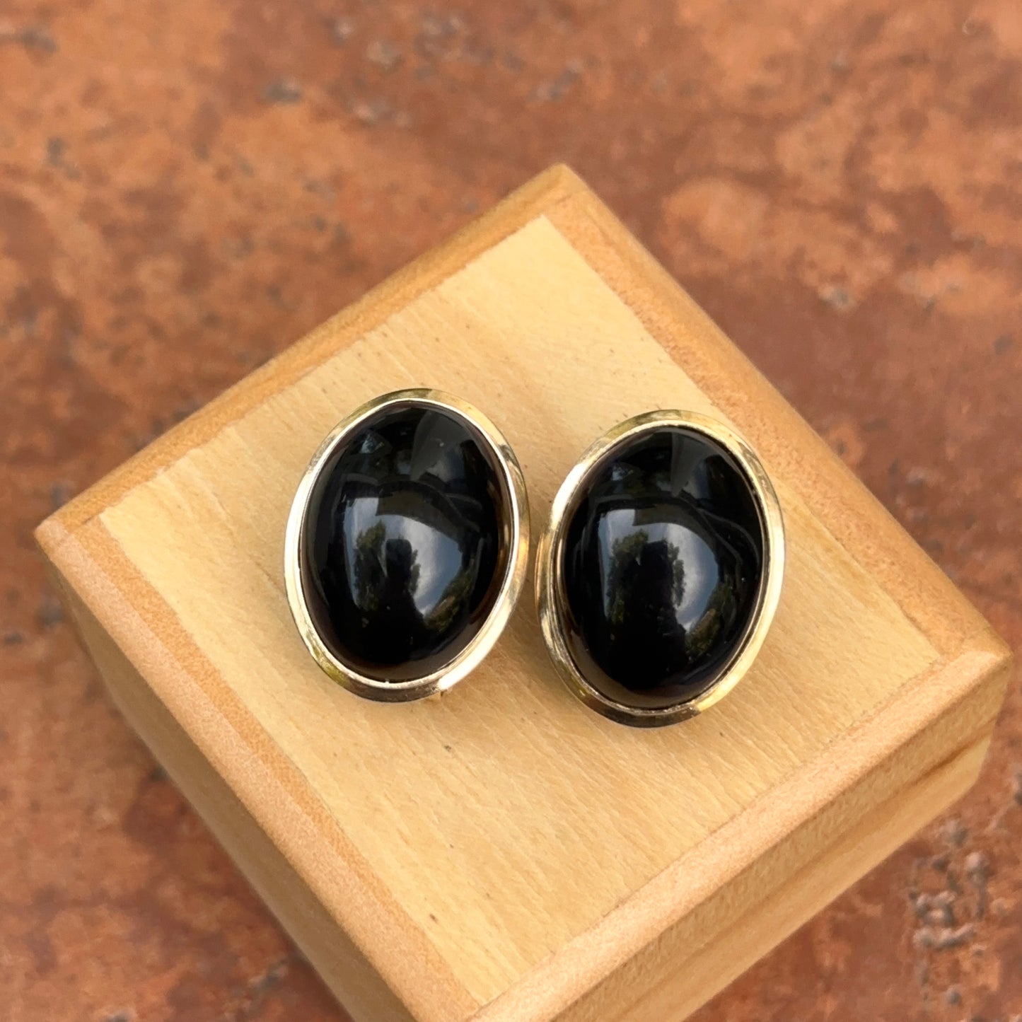 Estate 14KT Yellow Gold Oval Black Onyx Omega Back Bezel Earrings