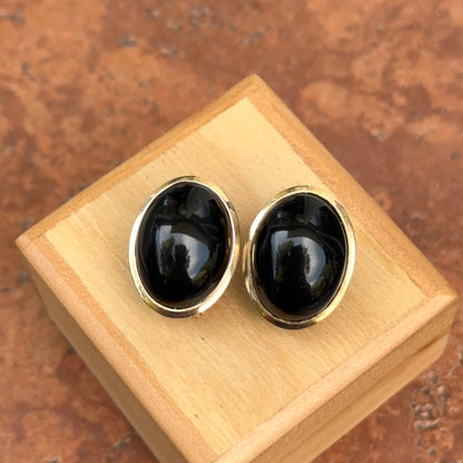 Estate 14KT Yellow Gold Oval Black Onyx Omega Back Bezel Earrings