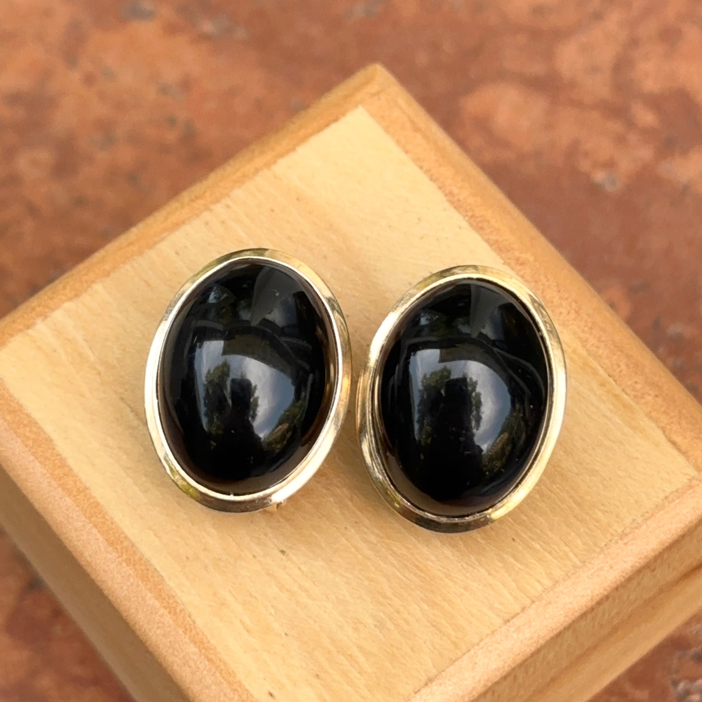 Estate 14KT Yellow Gold Oval Black Onyx Omega Back Bezel Earrings