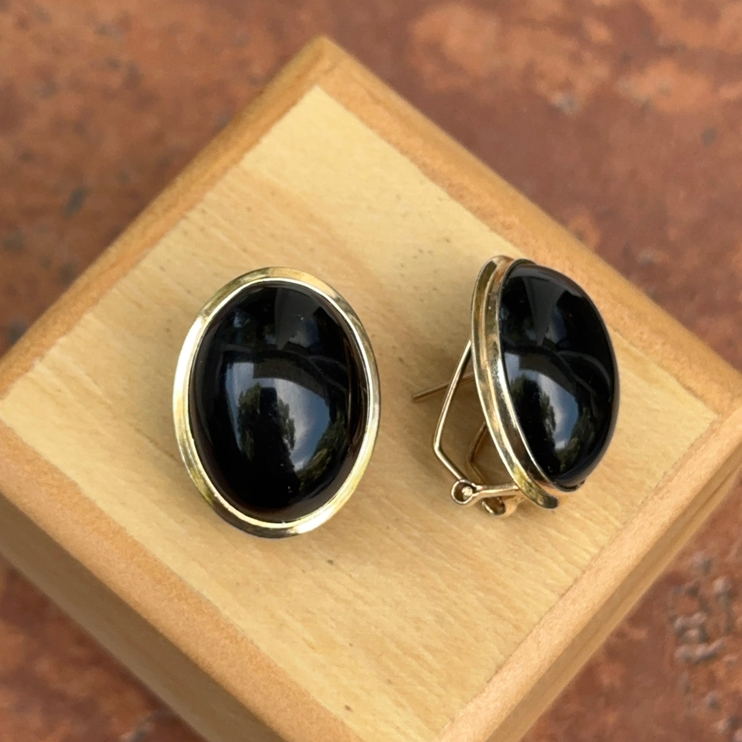 Estate 14KT Yellow Gold Oval Black Onyx Omega Back Bezel Earrings