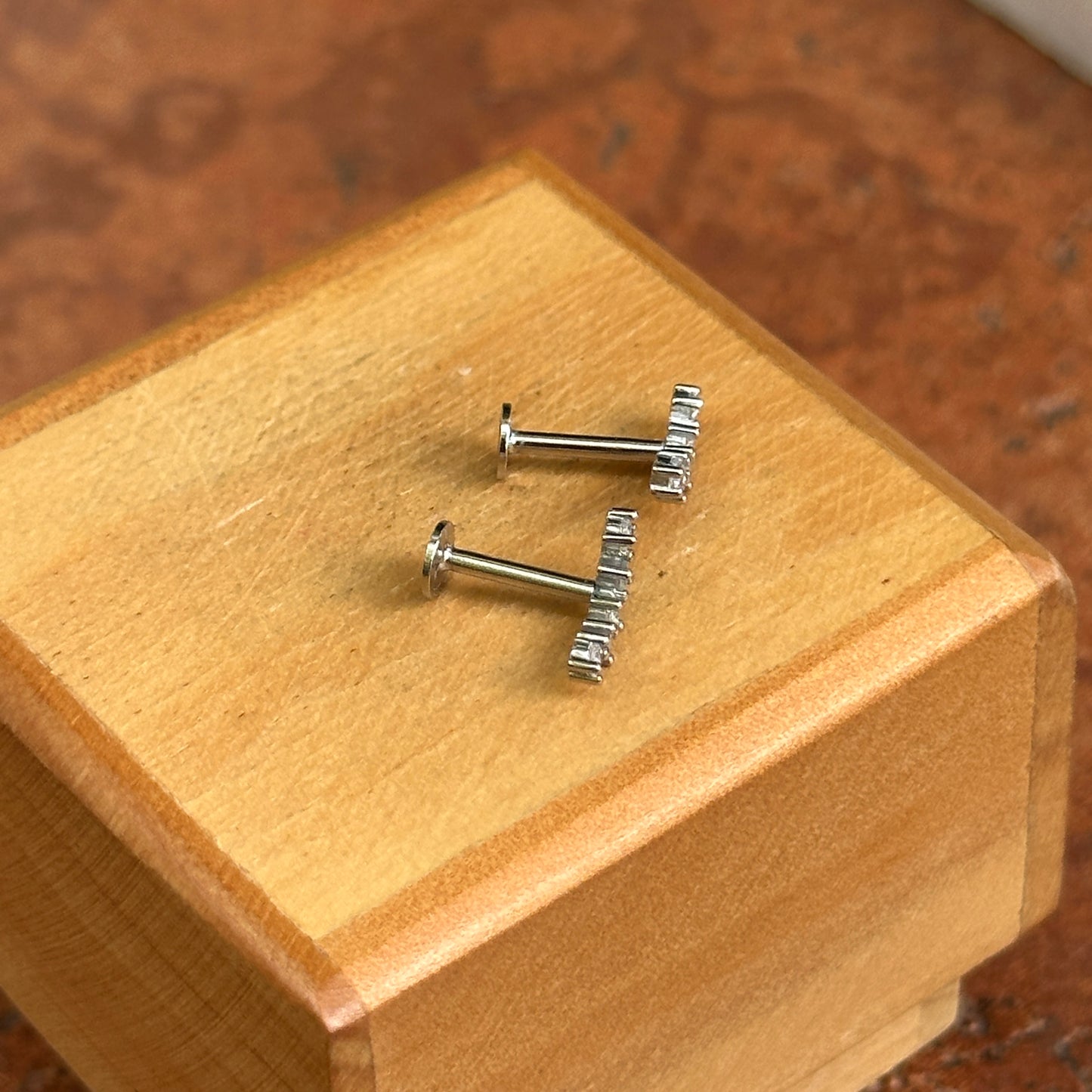 Sterling Silver Curved Round Cubic Zirconia Stud Earrings