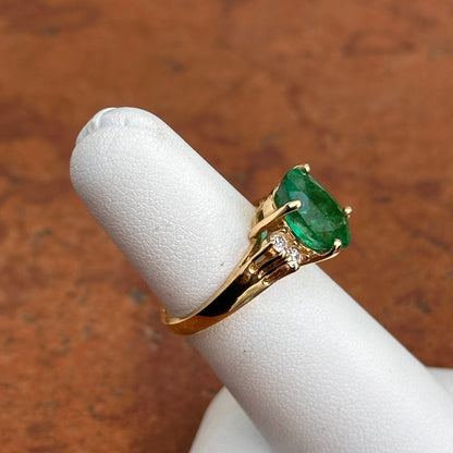 14KT Yellow Gold Oval 3.48 CT Emerald + Round Diamond Ring