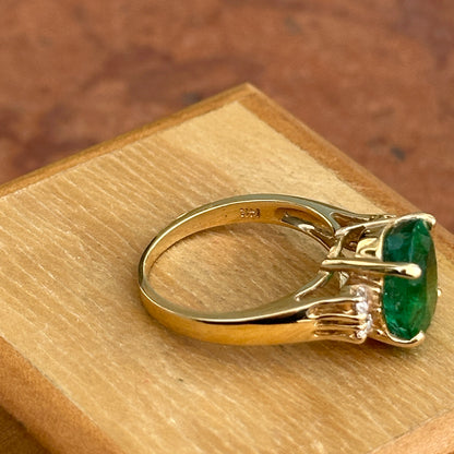 14KT Yellow Gold Oval 3.48 CT Emerald + Round Diamond Ring