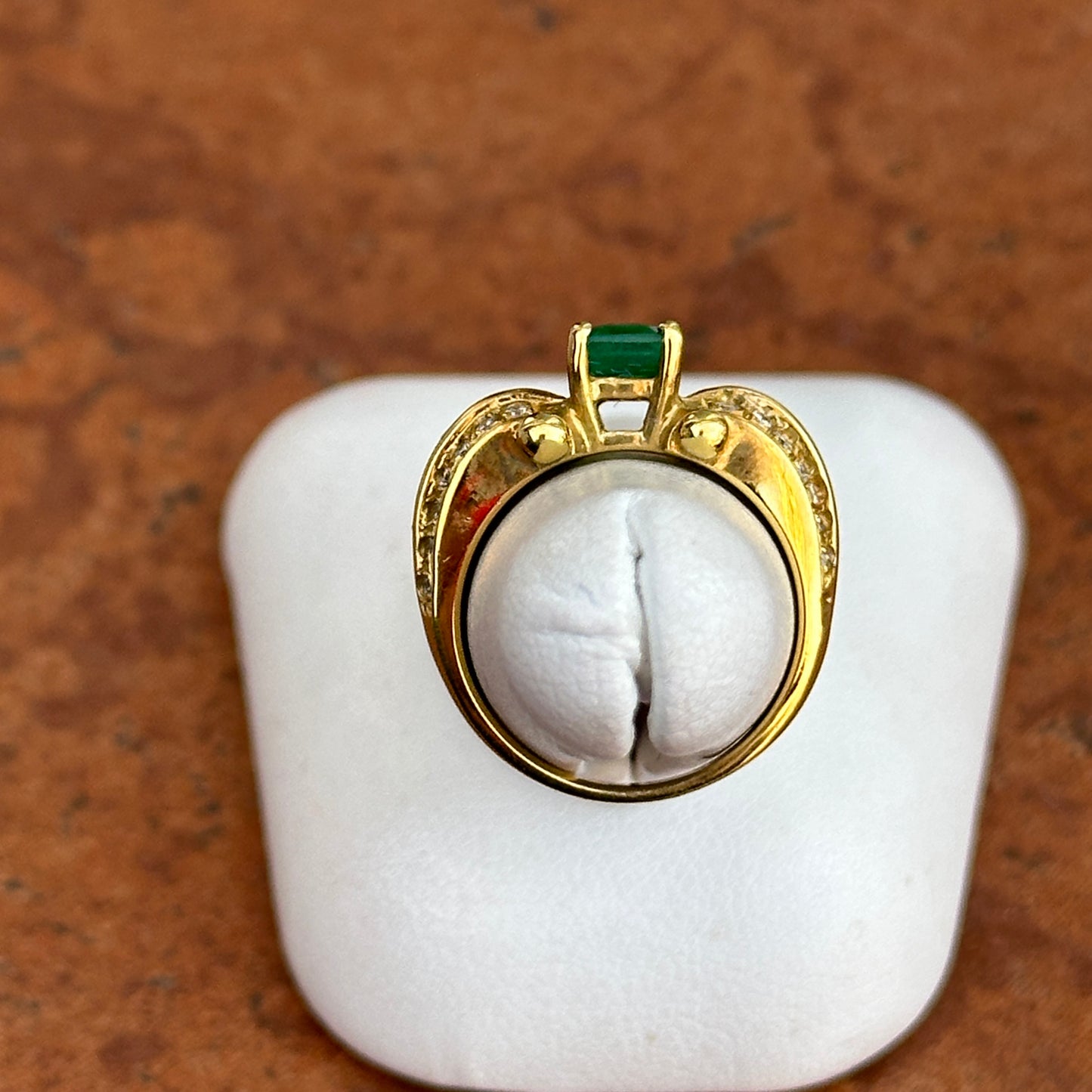 18KT Yellow Gold Emerald Cut Green Emerald + Round and Baguette Diamond Ring