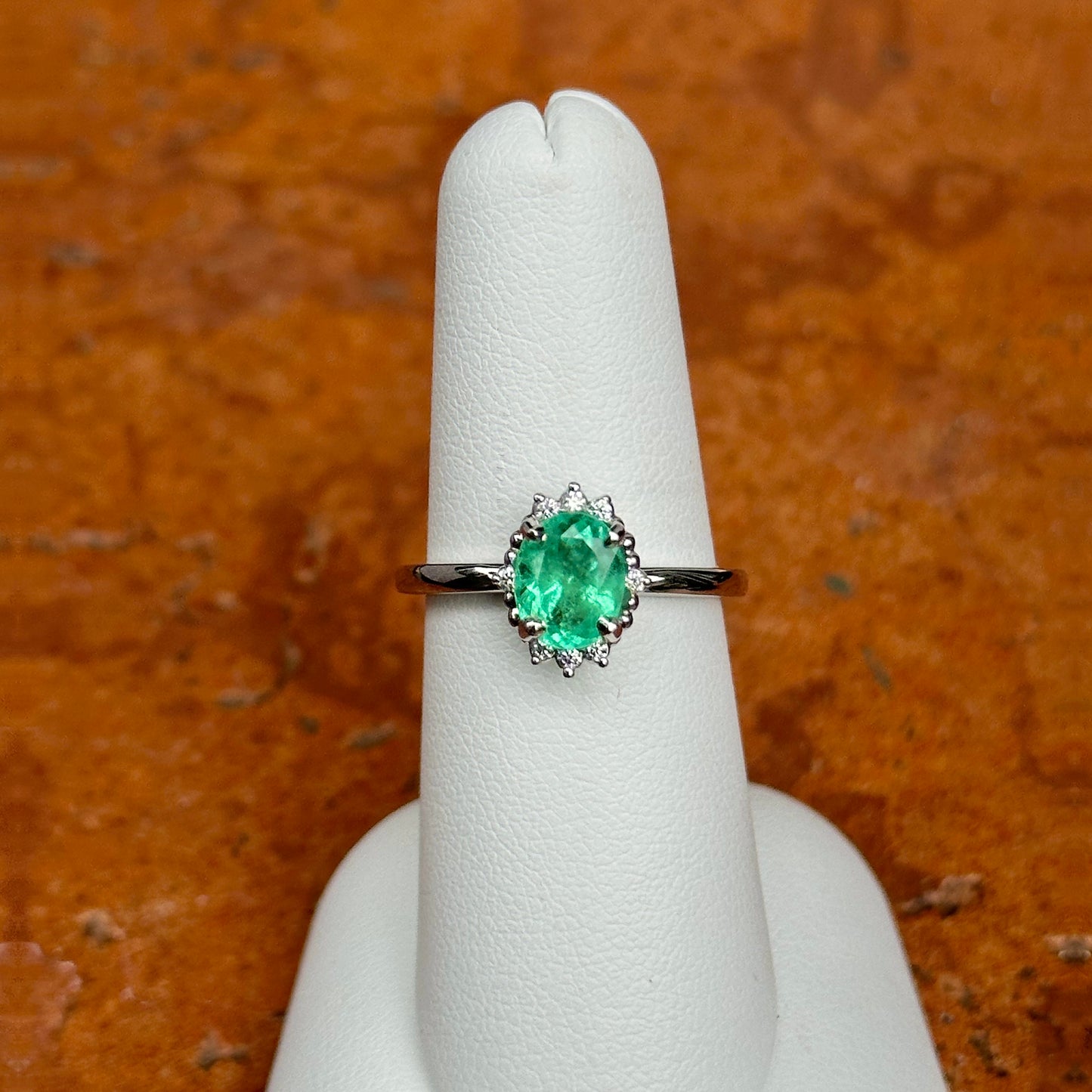 14KT White Gold Oval Colombian Emerald + Halo Diamond Ring