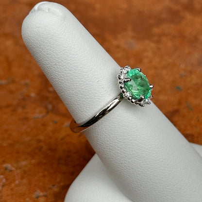 14KT White Gold Oval Colombian Emerald + Halo Diamond Ring