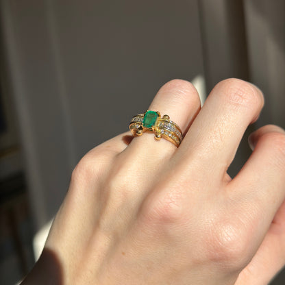 18KT Yellow Gold Emerald Cut Green Emerald + Round and Baguette Diamond Ring