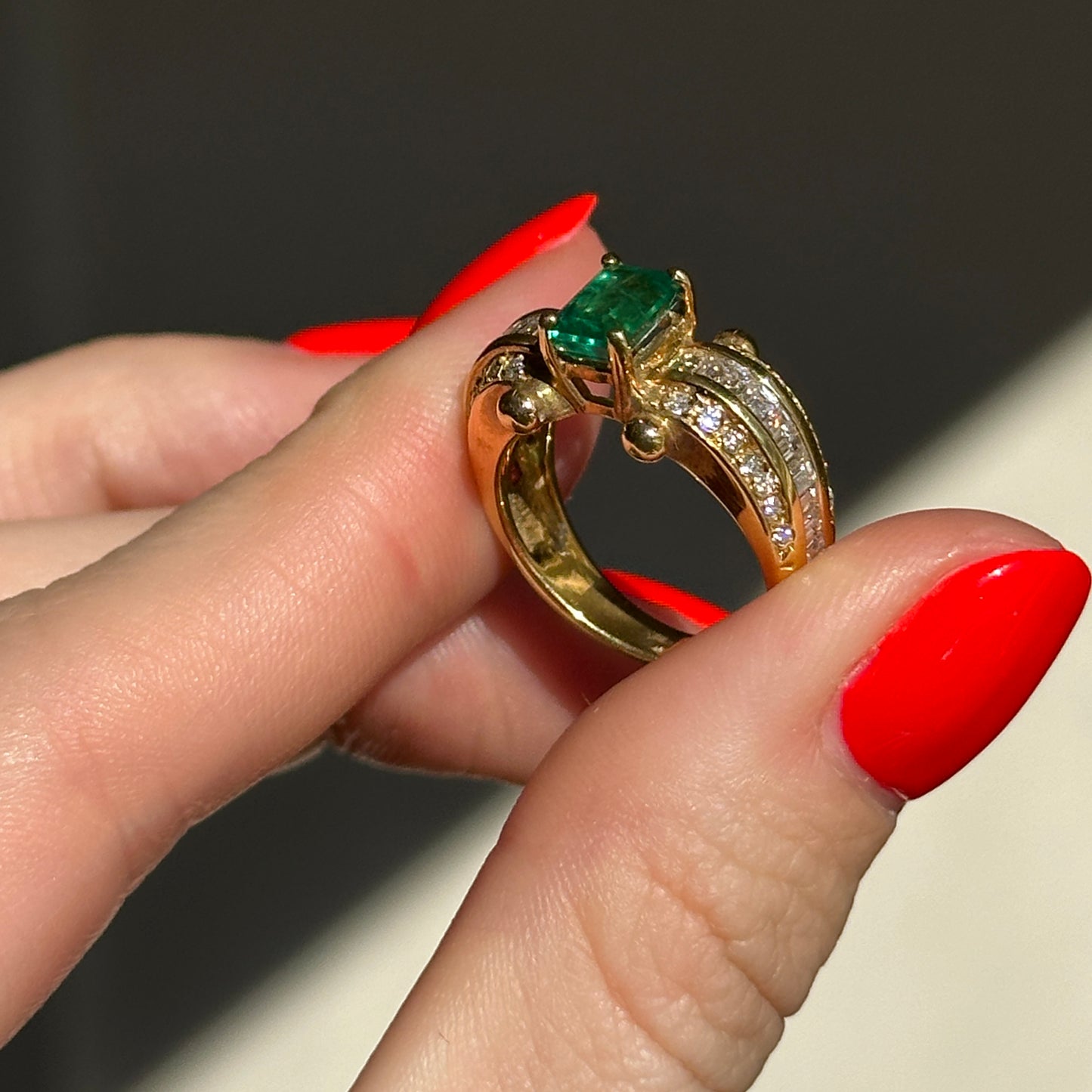 18KT Yellow Gold Emerald Cut Green Emerald + Round and Baguette Diamond Ring