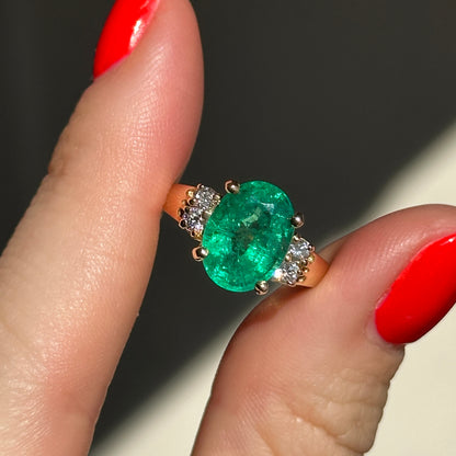 14KT Yellow Gold Oval 3.48 CT Emerald + Round Diamond Ring