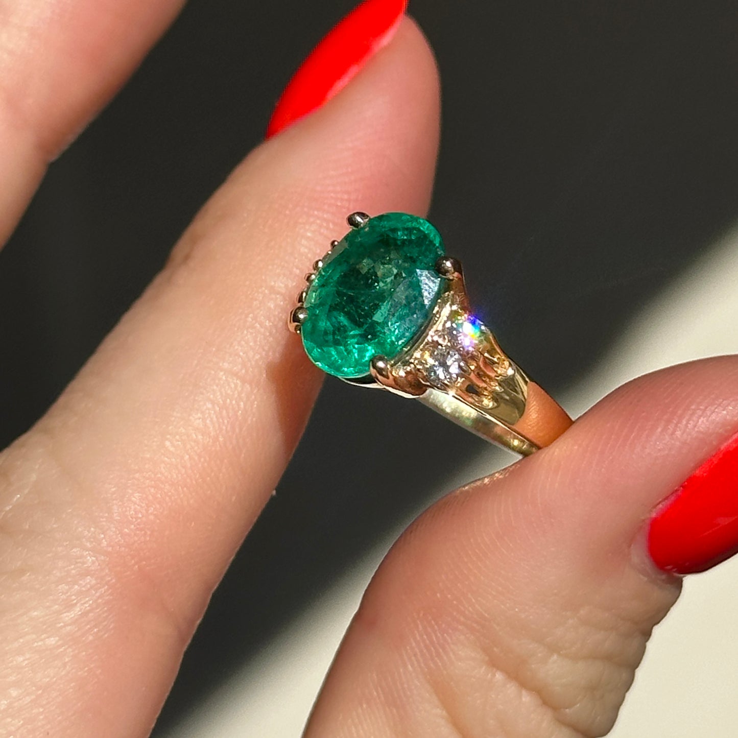 14KT Yellow Gold Oval 3.48 CT Emerald + Round Diamond Ring