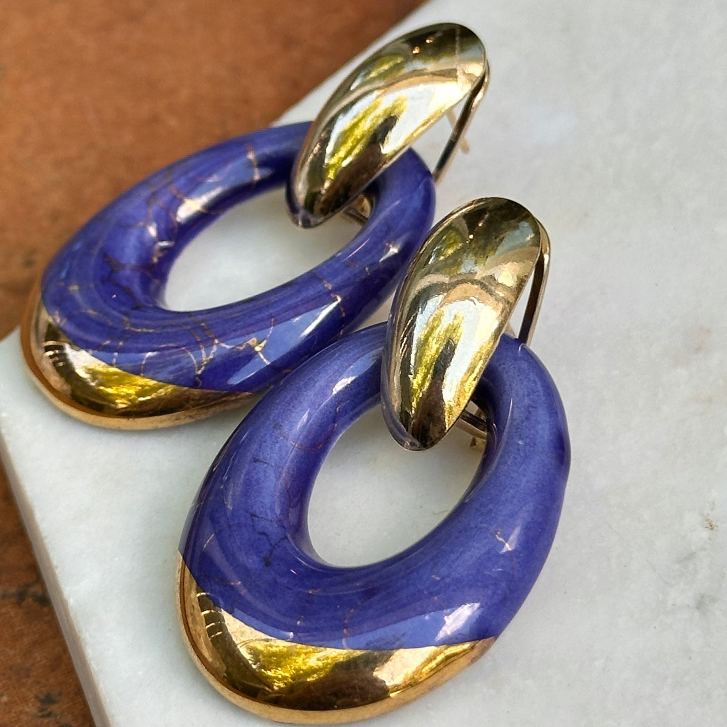 Yellow Gold Tone Pierced Omega Earrings + Oval Blue and Gold Enameled Charms