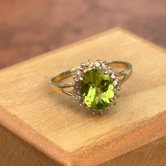 Estate 14KT Yellow Gold Faceted Oval Cut Peridot + Diamond Halo Ring