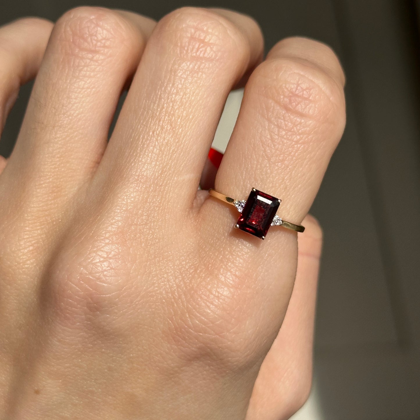 14KT Yellow Gold Emerald Cut Garnet Round Full Cut Diamonds Ring