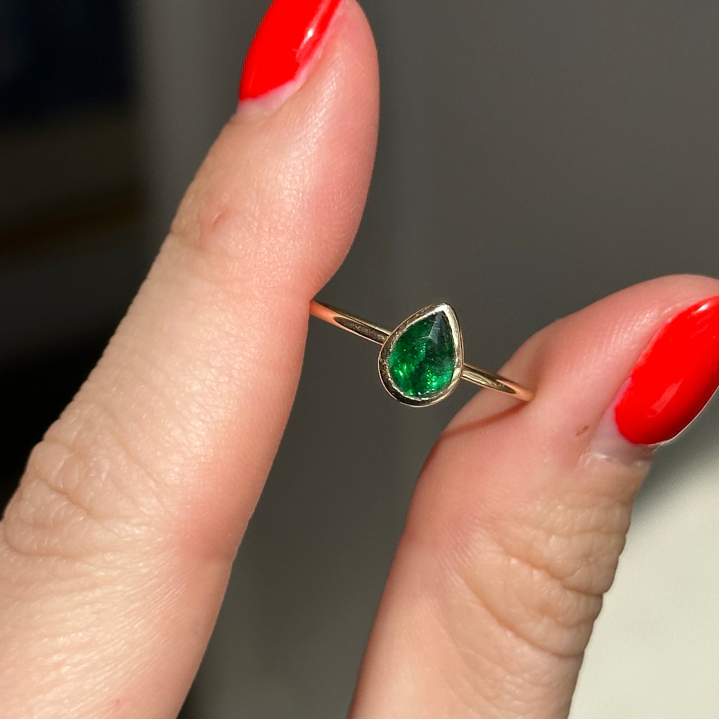 14KT Yellow Gold .65 CT Pear Emerald Bezel Ring