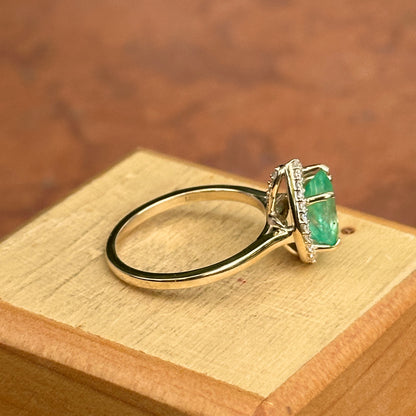 14KT Yellow Gold Pear Colombian Emerald + Halo Diamond Ring