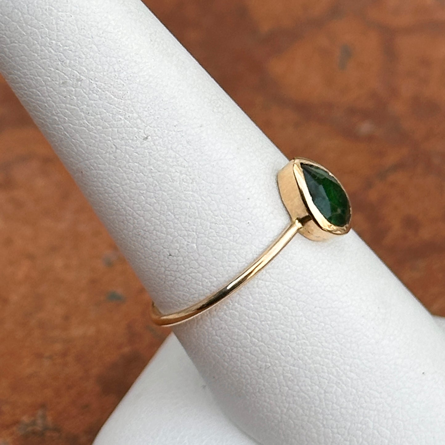 14KT Yellow Gold .65 CT Pear Emerald Bezel Ring
